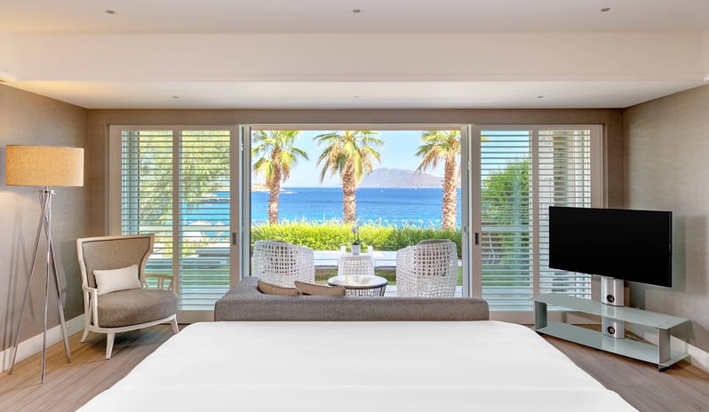 CARESSE HOTEL - DELUXE MARINE SUITE BEDROOM